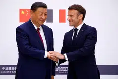 French President Emmanuel Macron (right) shakes hands with China's President Xi Jinping after a joint statement at the Elysee Palace in Paris, France, May 6, 2024, during the Chinese president's two-day state visit to the country.  