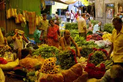 Indian flower vendors at the Mallick Ghat flower market, in Kolkata, India, July 23, 2024. 