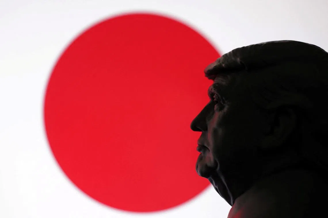 FILE PHOTO: A 3D-printed miniature model of U.S. President Donald Trump and the Japan flag are seen in this illustration taken July 23, 2025. REUTERS/Dado Ruvic/Illustration/File Photo