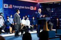 South Korean President Yoon Suk Yeol looks on as US President Joe Biden delivers remarks at the Samsung Electronics Pyeongtaek Campus in Pyeongtaek, South Korea, May 20, 2022. 