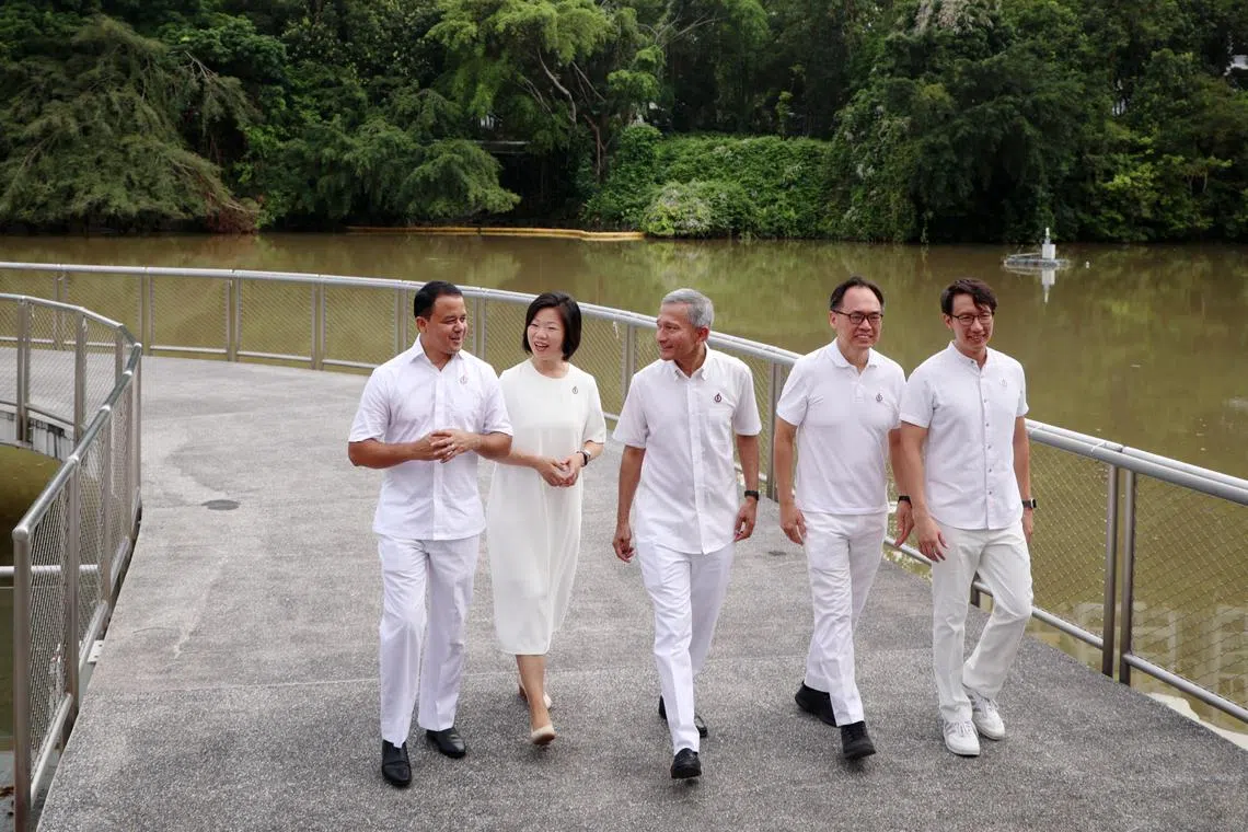 From left: The PAP team for Holland-Bukit Timah GRC features Christopher de Souza, Sim Ann, Vivian Balakrishnan and Edward Chia (extreme right). With them is Liang Eng Hwa (second from right), who will defend the single-seat Bukit Panjang ward.