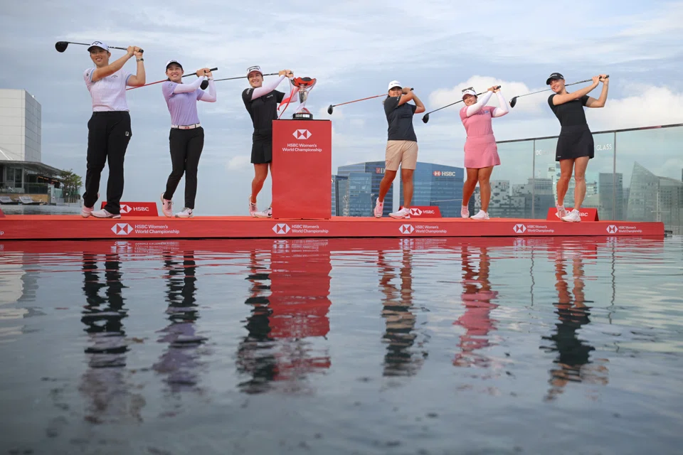 From left: Golfers Yin Ruoning, Jeeno Thitikul, Hannah Green, Shannon Tan, Lilia Vu and Charley Hull by the SkyPark Infinity Pool at Marina Bay Sands.