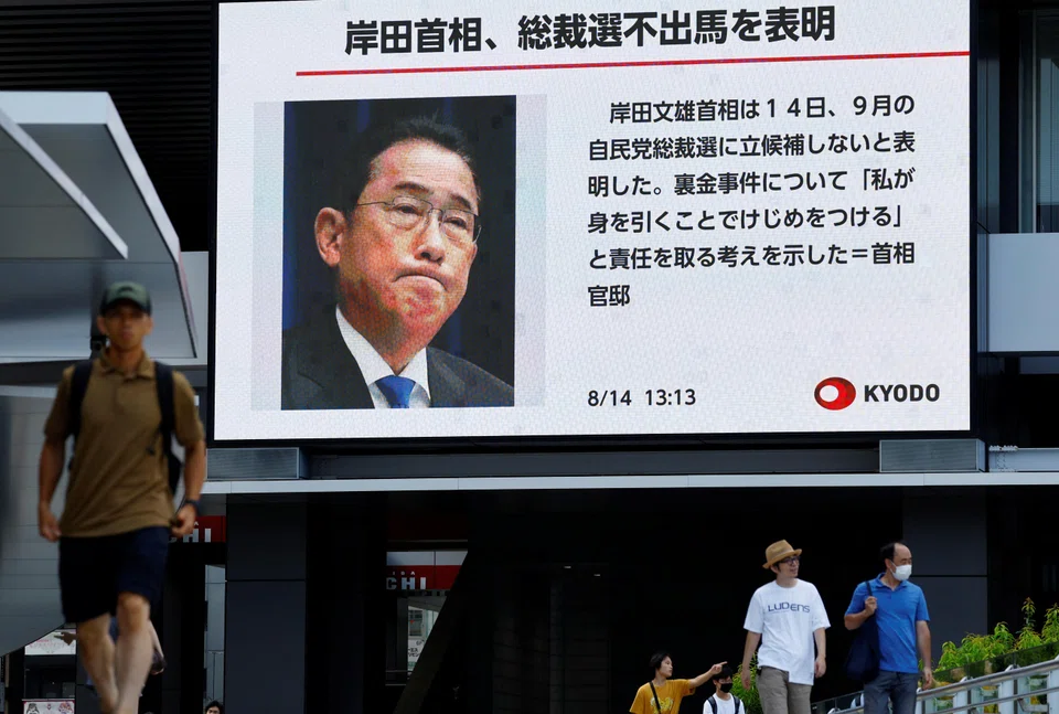 News about Japanese Prime Minister Fumio Kishida's resignation flashing on public screens in Tokyo on Aug 14.