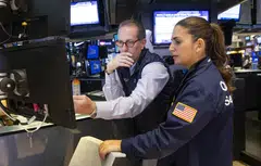 The Dow Jones Industrial Average falls 9.66 points or 0.02 per cent at the open to 39,863.33.