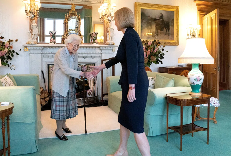 Queen Elizabeth welcomes Liz Truss during an audience where she invited the newly elected leader of the Conservative party to become Prime Minister and form a new government, at Balmoral Castle, Scotland, Britain September 6, 2022. 