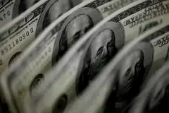 The US dollar index was up 0.6 per cent at 102.69, notching a weekly gain of 1.4 per cent.