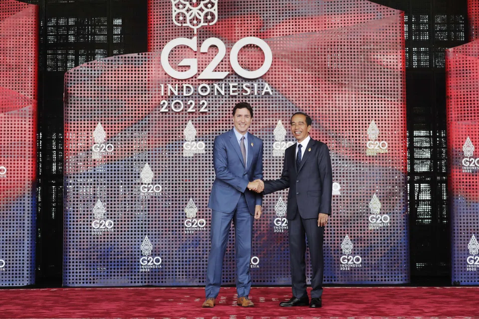 Canada's Prime Minister Justin Trudeau (left) meets Indonesia's President Joko Widodo as he arrives for the G20 leaders' summit in Nusa Dua, Bali on Nov 15, 2022. Indonesia is keen to utilise its nickel reserves to attract investment into metal processing and further down in the supply chain.