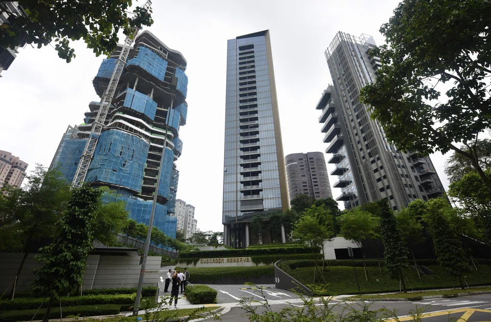 The rising level of unsold stock may signal bad news for some projects, such as the 99-year leasehold Cuscaden Reserve (centre), with an impending sales deadline this year.