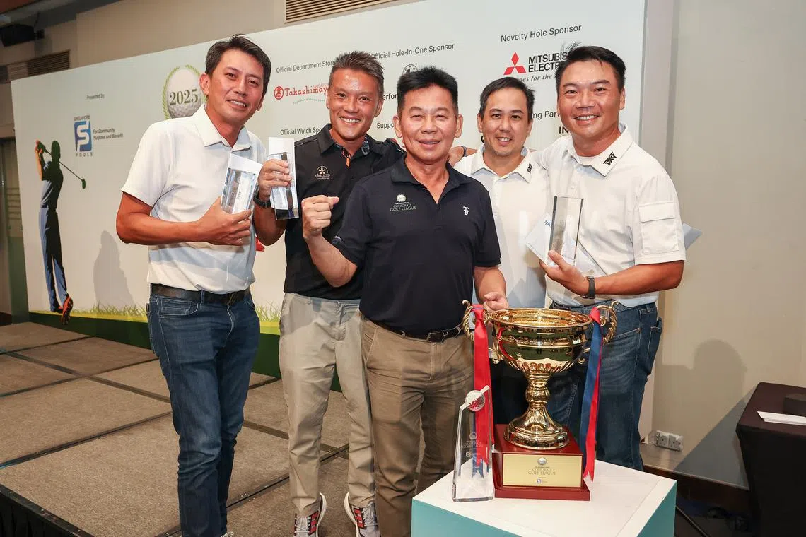 The golfers from Team Orchid Country Club celebrate with the trophy they bagged for emerging tops in The Business Times Corporate Golf League 2025.