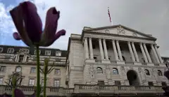 Several economists disagree with the Bank of England's "sanguine" view that the UK will avoid a recession, noting high levels of indebtedness and inflation in the economy.