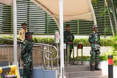 Military personnel have been deployed to guard a mall in the Jakarta area following violent protests over the weekend.