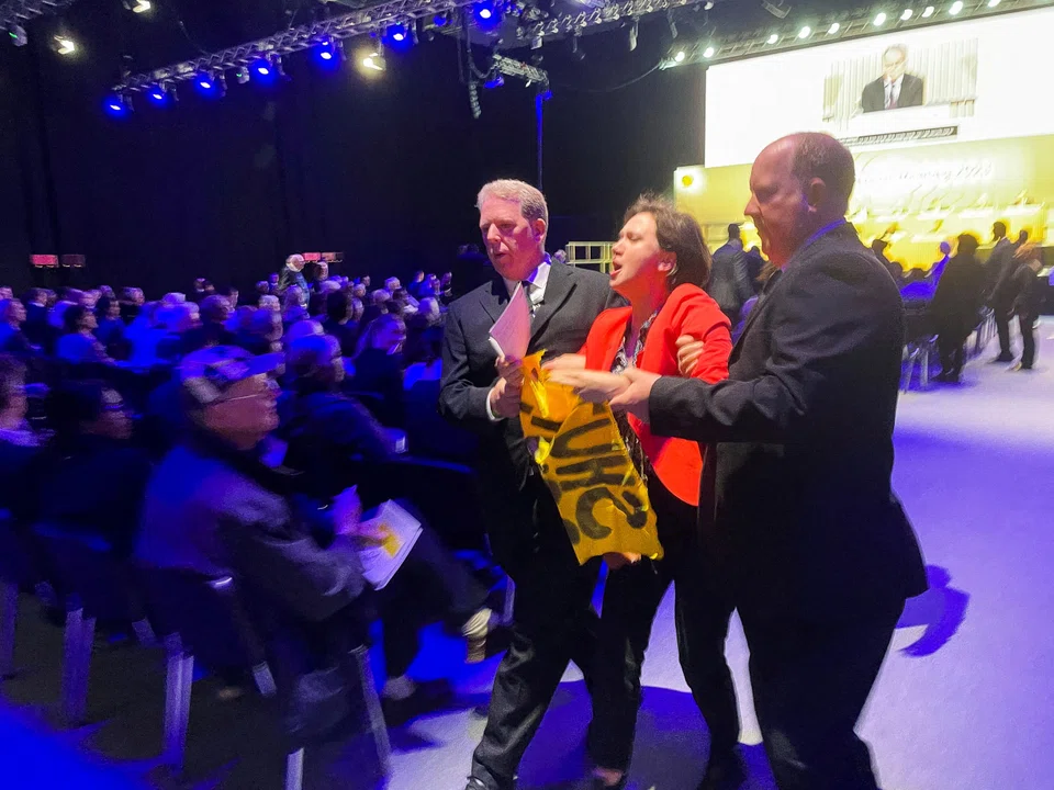 More than 100 activists interrupt the opening remarks from chief executive Wael Sawan, according to Fossil Free London, while others attempt to occupy the stage.