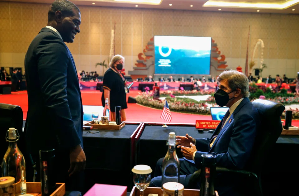 US Special Presidential Envoy for Climate John Kerry (R) meeting Environmental Protection Agency Administrator Michael Regan (L) during the G20 Joint Environment and Climate Ministers' Meeting in Nusa Dua, Bali, Indonesia, 31 August.