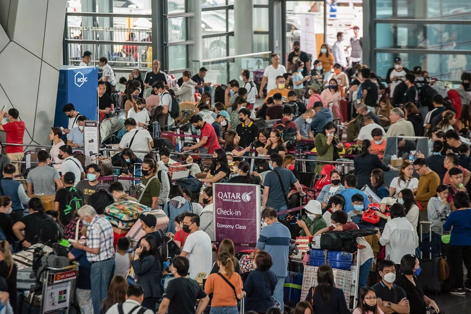 Several of the airport’s four terminals were crowded on Monday, with long queues of people trying to rebook flights while other weary passengers slept on chairs or on the floor.