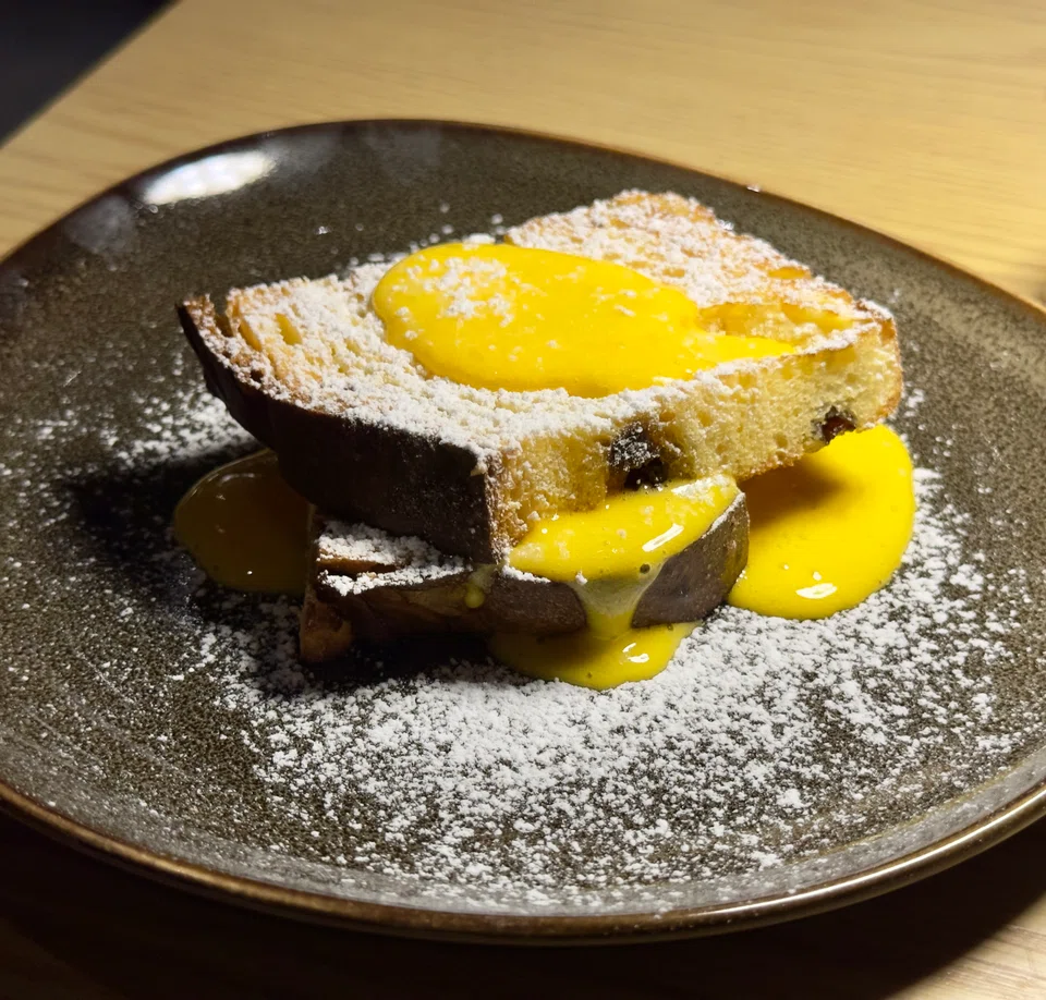 Moist and sweet panettone is served with vermouth zabaglione.