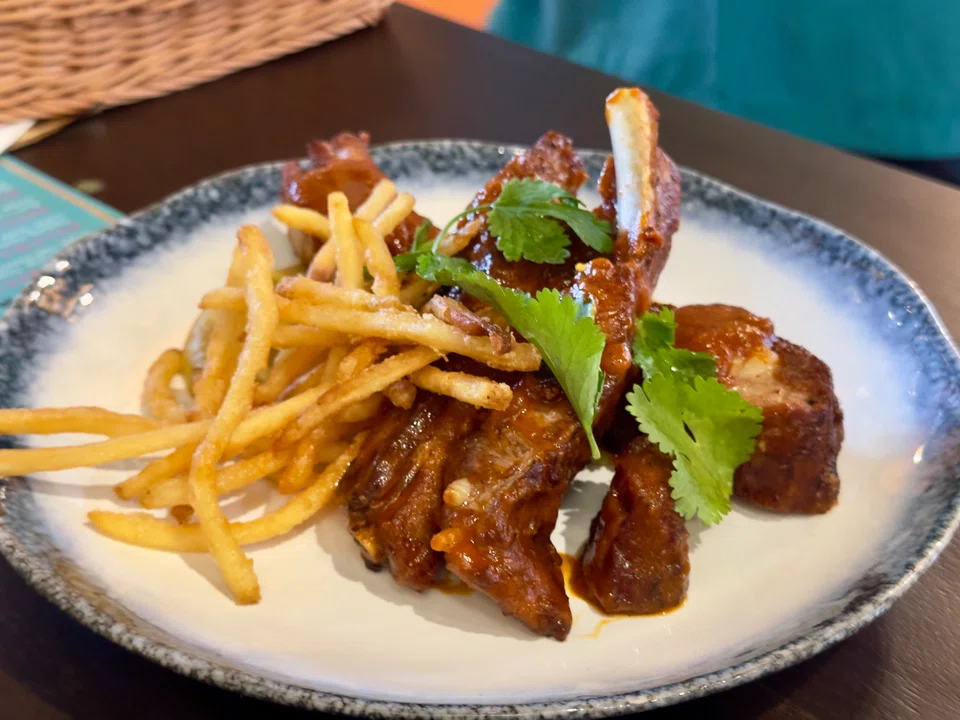 Hefty BBQ pork ribs and crunchy shoestring fries.