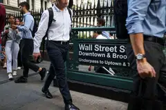 The new forecast follows an upbeat second quarter on Wall Street, where traders saw record revenue as uncertainty around tariffs and tax policy drove a surge of activity across the stock market.