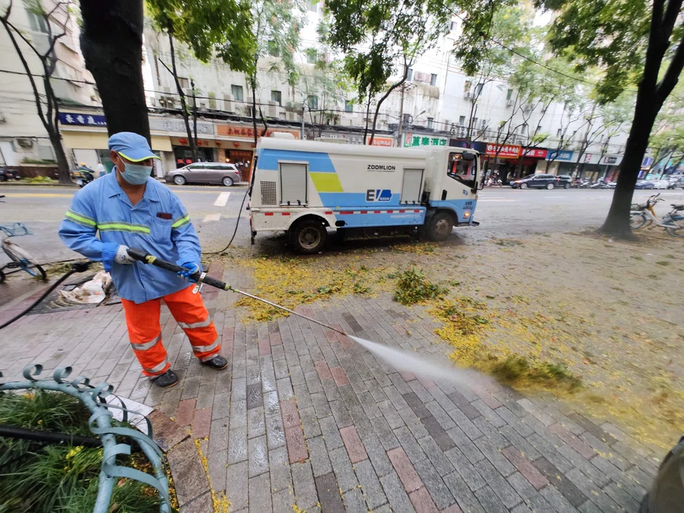 Initial reports suggested limited damage and minor flooding around Shanghai, though local media reported that more than 400,000 people were evacuated.
