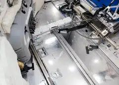 A replica of the toilet aboard the Artemis II, used for training at the Johnson Space Center, Houston. The Universal Waste Management System comes equipped with a funnel and hose for urination, and there is a seat with a hole for bowel movements.