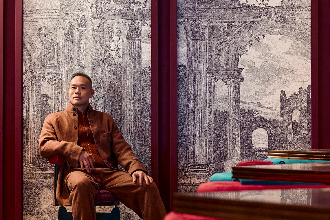 It was only after spending 10 years in the civil service that John Lim got to start his entrepreneurial journey. He wears a tobacco silk and linen Il Conte jacket, tobacco linen Oasi Lino bomber jacket, tobacco silk Oasi Lino one-pleat trousers, and dark brown suede leather moccasins, all from Zegna.