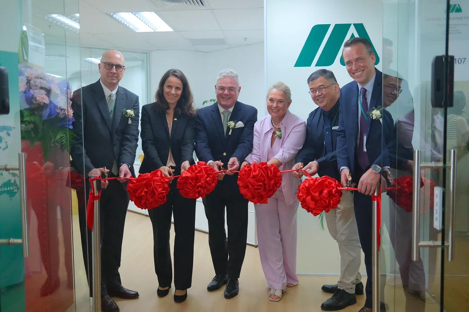 At the opening of Munzing Group's regional head office were (from left) Munzing Group's chief operating officer Patrick Lowery, Germany's ambassador to Singapore Bettina Fanghanel, Munzing Group's chief executive officer Michael Munzing and his wife Sabine, the company's managing director Hector Chow and its chief financial officer Malte Koffka.