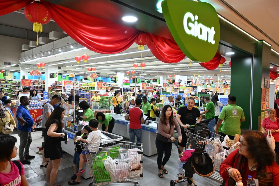 Giant supermarket at IMM. DFI sold its Giant and Cold Storage supermarkets to Malaysia's Macrovalue for S$125 million.