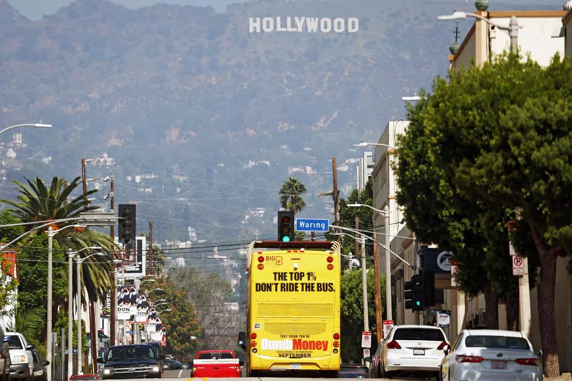 A tour bus in Hollywood advertises the film ''Dumb Money", September 2023. 