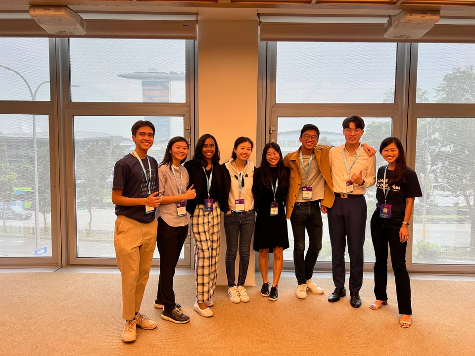 Gan Kah Shuen (fifth from left), a YFS participant in 2021 who is now a Singapore country director, with other country directors for Singapore and Malaysia, and co-founder Lim Ee Ling (far right).