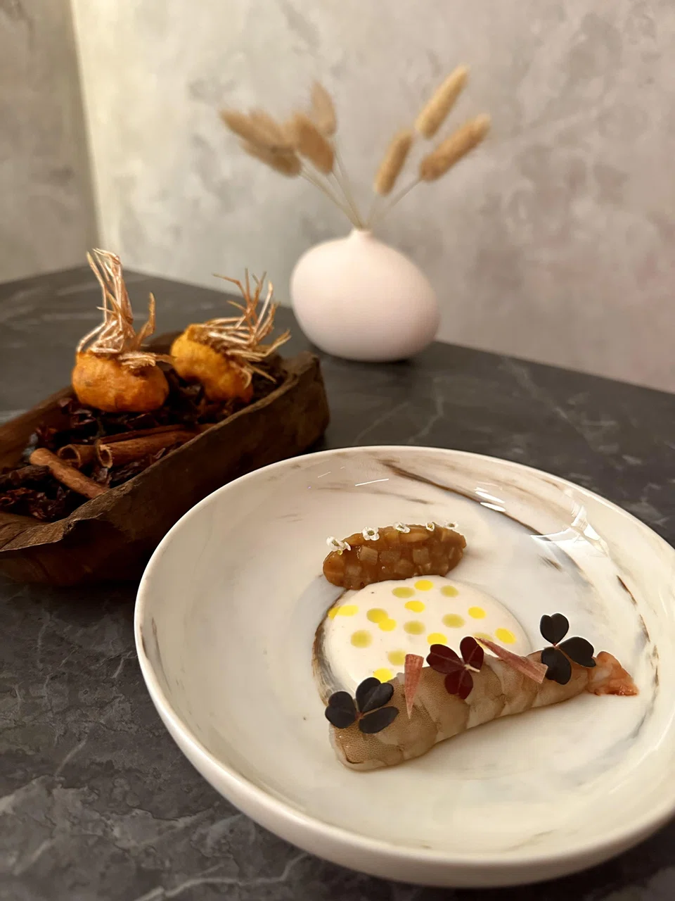 Obsiblue prawn is served with deep fried prawn heads.