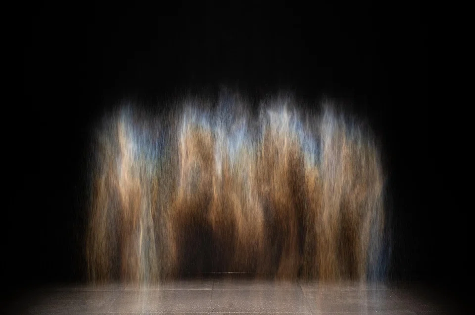 This early Olafur Eliasson work, titled 'Beauty' (1993,) uses light and water to create a moving rainbow you can play with.