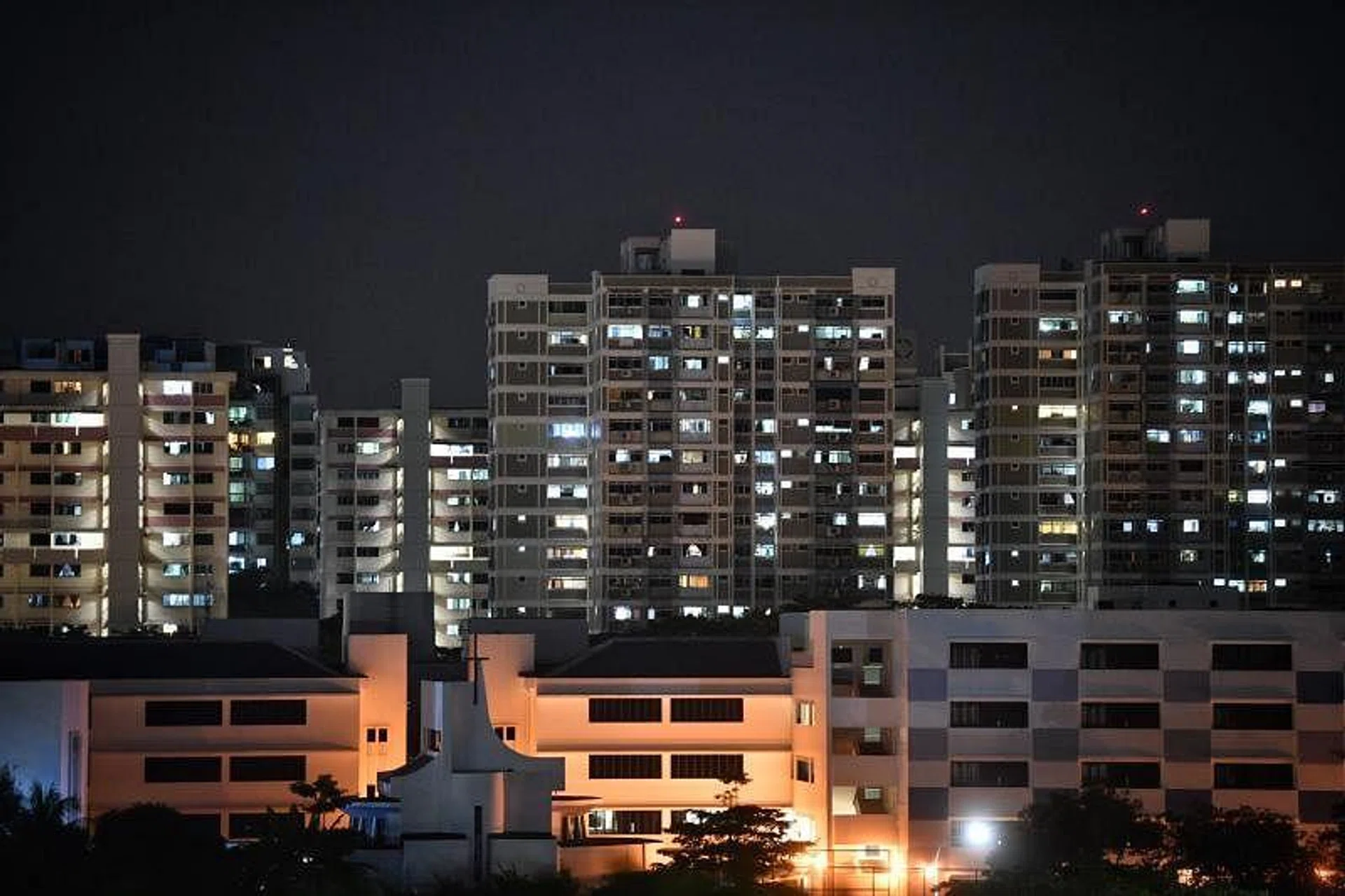 Economists expect raised inflation forecast, MAS policy tightening in April on war-led cost pressures