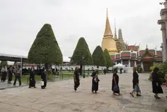 In public spaces from streets to sky trains, a majority of Thais can be seen donning black or darker colours over the past few days.