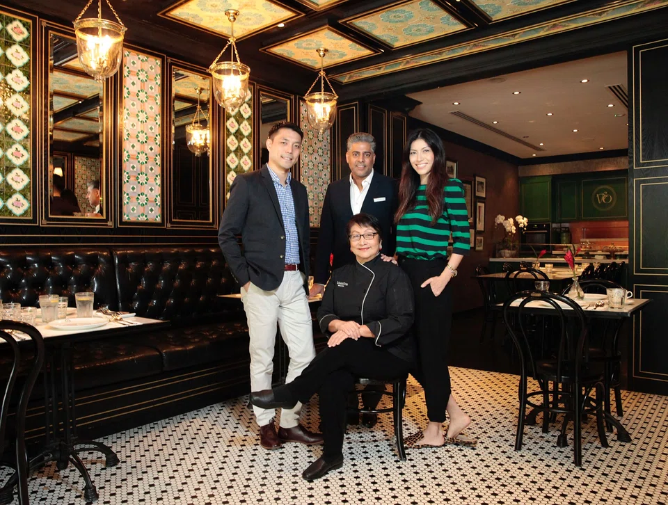 Restaurateur Violet Oon (seated) with (standing, left to right) her son Tay Yiming, business partner Manoj Murjani and her daughter Tay Su-Lyn. Murjani has taken the stand for the first time as the defendent of a shareholder oppression case brought by Oon and her family. 