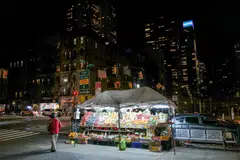 A vendor selling fruits and vegetables in New York last December. The US personal consumption expenditures index ticked up in December to 2.9%, within distance of the Fed's comfort level of 2% annual inflation.