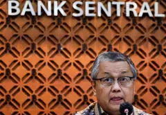 Indonesia's central bank governor Perry Warjiyo played down concerns about risks to Indonesian banks from problems at some global banks and said a government stress test showed domestic lenders were resilient.