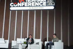 From left: eFishery CEO Gibran Huzaifah with SPH Media deputy CEO Kuek Yu Chuang during a panel discussion at the Tech in Asia Conference in Jakarta.