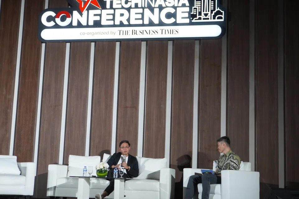 From left: eFishery CEO Gibran Huzaifah with SPH Media deputy CEO Kuek Yu Chuang during a panel discussion at the Tech in Asia Conference in Jakarta.