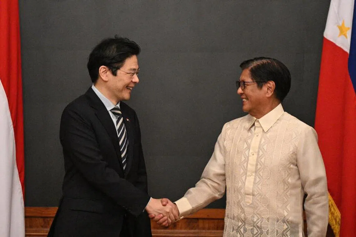 Singapore's Prime Minister Lawrence Wong (left) with Philippine President Ferdinand Marcos Jr at Malacanang Palace in Manila. 