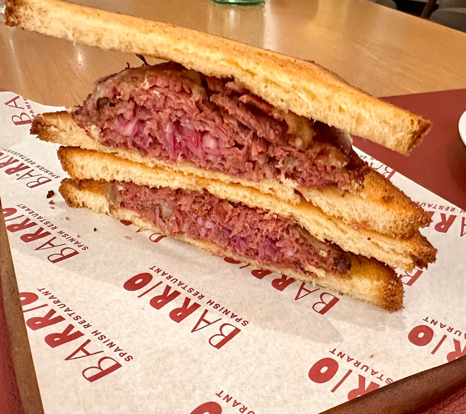 Barrio's bikini is disguised as a beef sandwich.