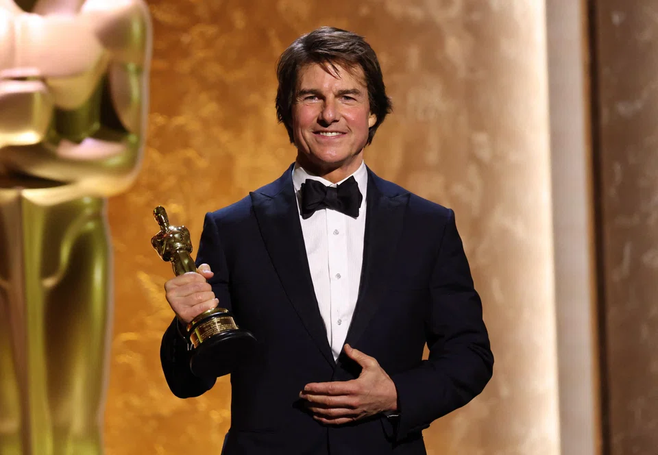 Tom Cruise with his Honorary Academy Award on stage during the 16th Governors Awards at the Ray Dolby Ballroom at Ovation Hollywood in Los Angeles. He has become a prominent champion for the movie business as it faces competition from streaming and social media.