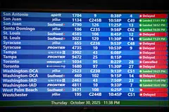 Cancelled flights are seen on a screen at Orlando International Airport in Orlando, Florida, Oct 30, 2025. The shutdown has forced 13,000 air traffic controllers and 50,000 Transportation Security Administration officers to work without pay and snarled tens of thousands of flights.