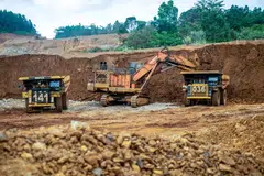 Excavators transferring soil to transport trucks at a nickel mine operated by nickel mining company Vale Indonesia in Sorowako on July 28, 2023. Government-backed Vale Indonesia aims to raise production to up to 70,800 tonnes. 