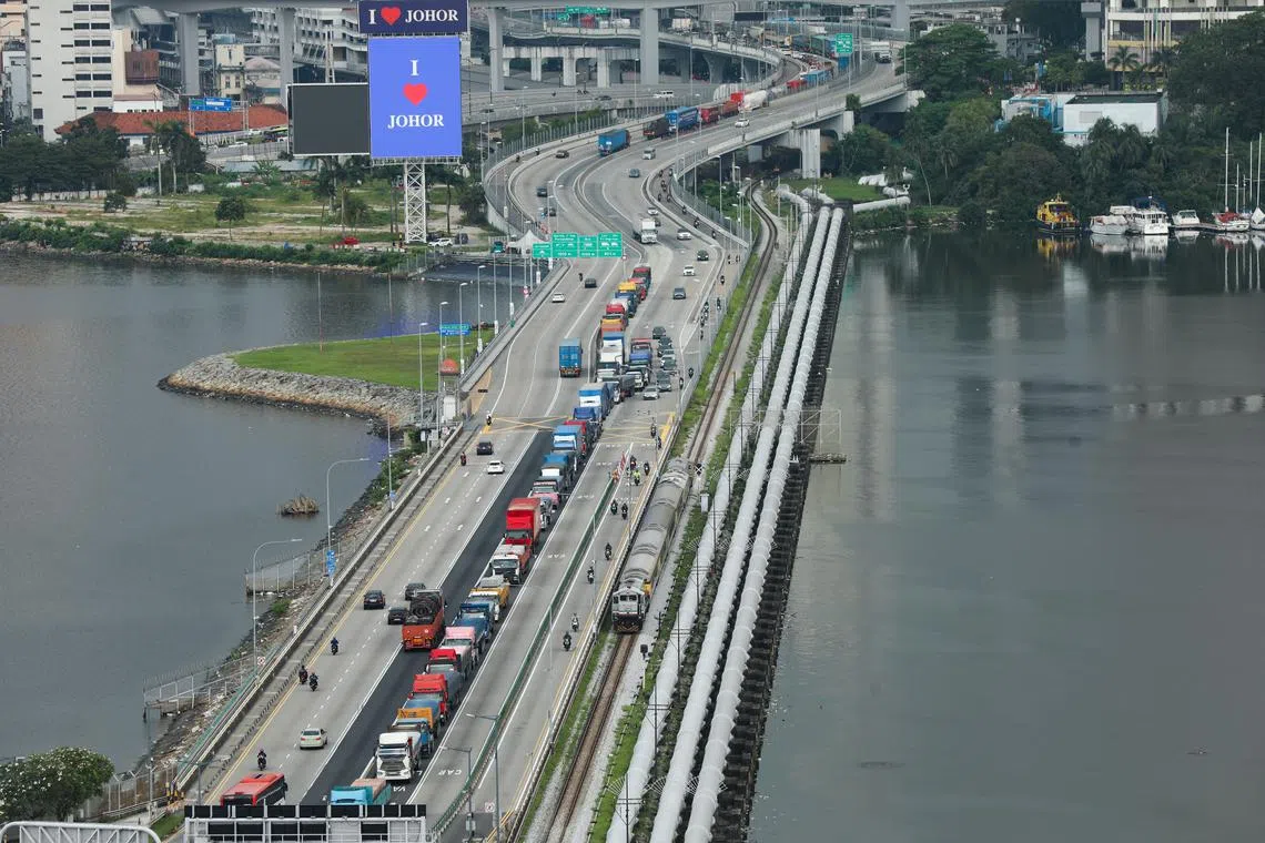 A view of the Johor-Singapore Causeway. The cost divergence between Singapore and Malaysia has become a lot bigger, especially after the Covid-19 pandemic, says CIMB's Chu Kok Wei.