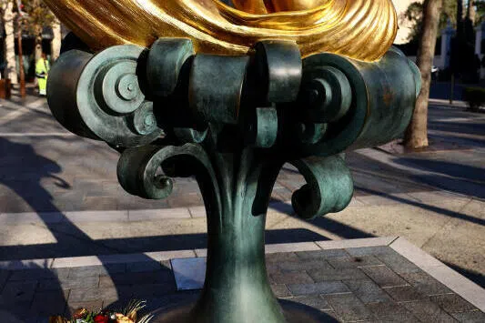 Flower tributes under a statue of the late French singer, actor and animal rights activist Brigitte Bardot.