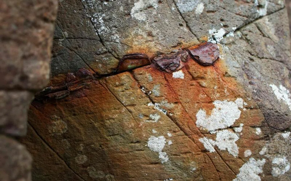 Rusting coins that are damaging the stones at the Giant's Causeway, are pictured at the Unesco World Heritage Site.