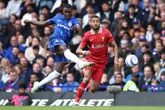 Chelsea midfielder Moises Caicedo (left) goes for goal in an EPL match against Liverpool at Stamford Bridge in London on May 4.  The immense popularity of the league has resulted in people turning to illegal streaming devices that allow them to catch the matches for free.