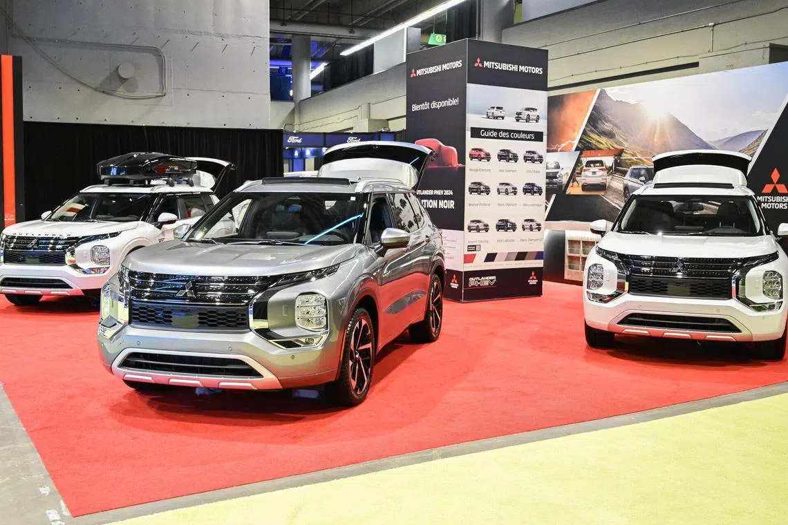Mitsubishi Motors at the Montreal Electric Vehicle Show. US protectionism against China is creating an opportunity for Japanese carmakers to bring EV production to North America.