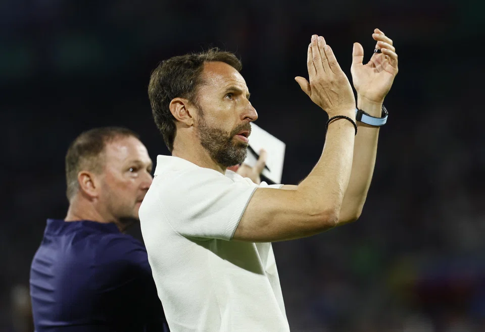 England manager Gareth Southgate applauds fans after their match against Slovenia. The Three Lions were already assured of a place in the last 16 but can expect more criticism after failing to improve on underwhelming performances in edging past Serbia and drawing with Denmark.