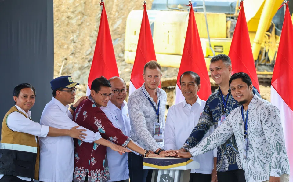 Indonesia President Joko Widodo (third from right) officially inaugurates the start of a Russia-backed construction project in the new capital city, Nusantara.