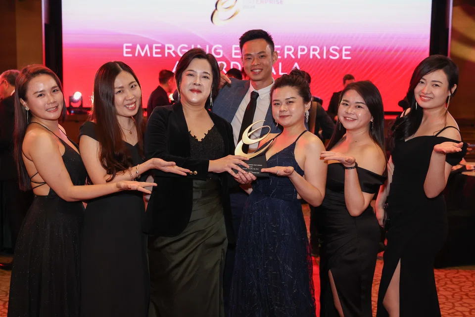 The team from Oncode Scientific celebrating. From left: Kathy,  administrative director; Dr Goh Share Yuan, chief scientific officer; Associate Professor Dr Lim Su Wen, founder & chief executive officer; Dave Ling, chief commercial officer; Dr Kow Koon Kee, co-founder & chief operating officer; Ying, accounts director; Dr Amy Teh, chief strategy & project officer.